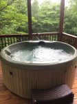 Relax in hot tub on lower deck.